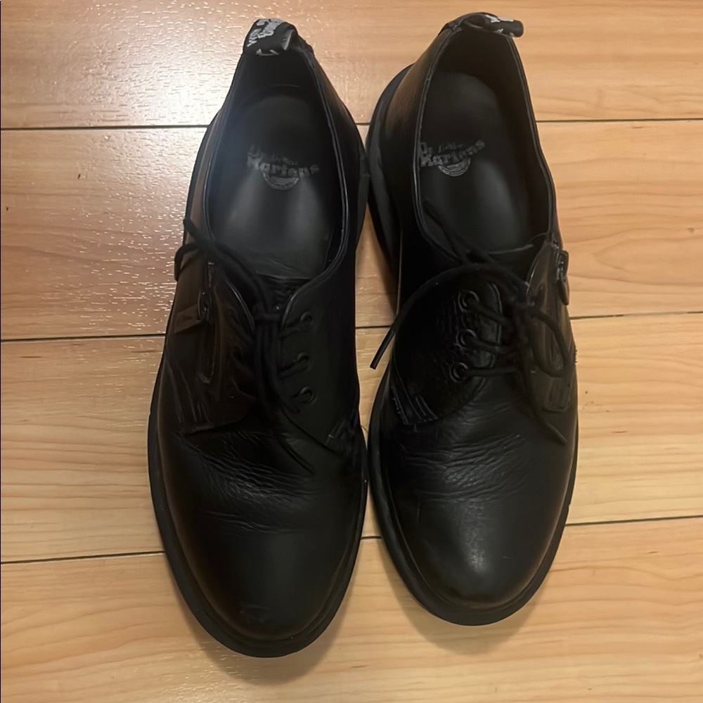 Dr. Martens Black Oxfords with Smooth Leather Upper and Lace-Up Closure